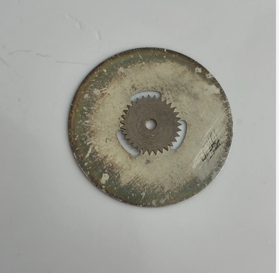 Rolex 1035 - 7070 Roulette Date Disc with Star