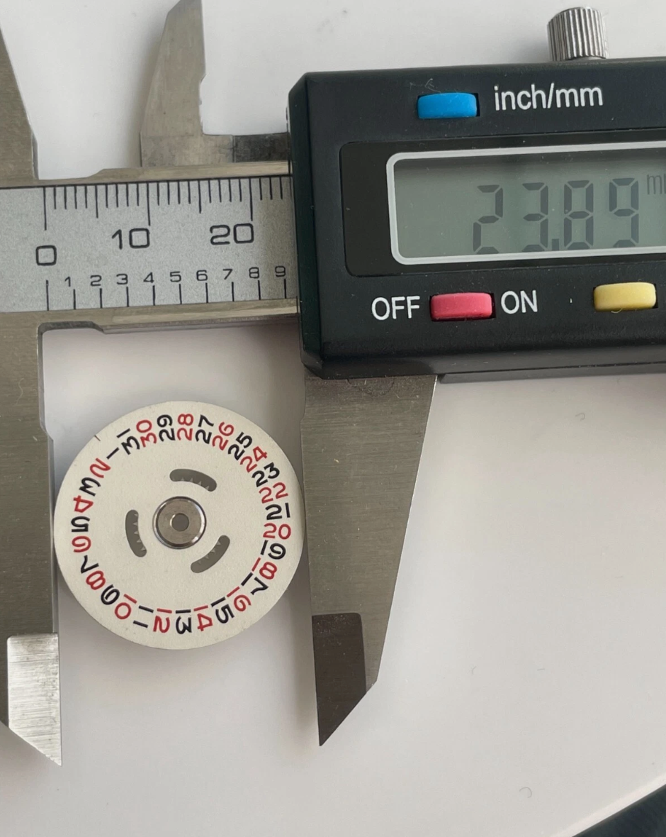 Rolex 1035 - 7070 Roulette Date Disc with Star