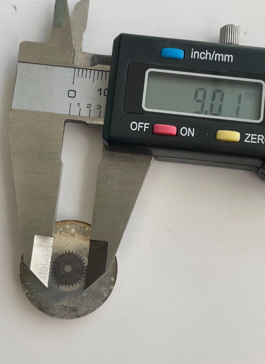 Rolex 1035 - 7070 Roulette Date Disc with Star